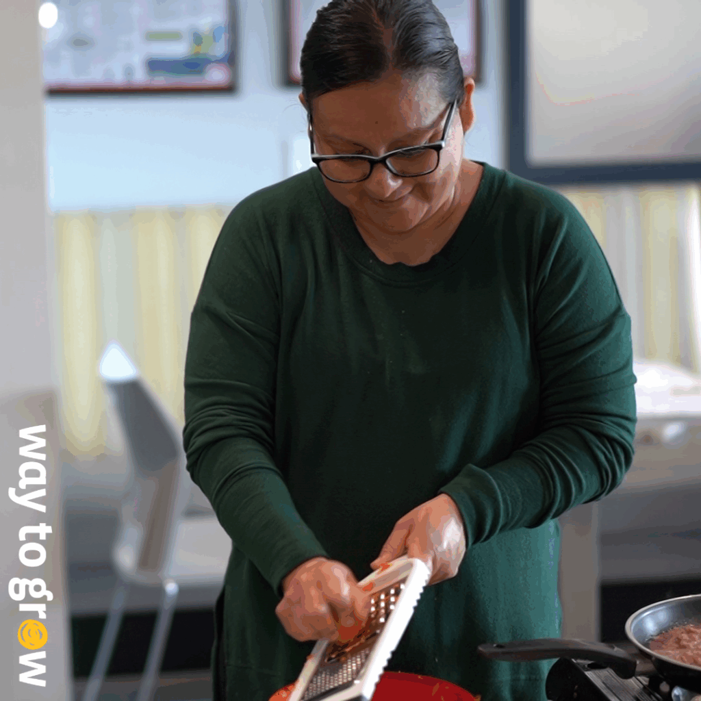 Way to Grow mom preparing vegetables during class